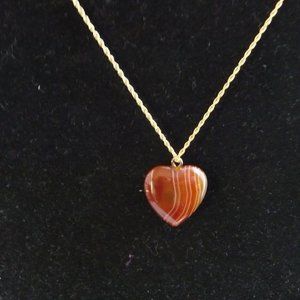 Banded carnelian pendant on 16ins gold chain